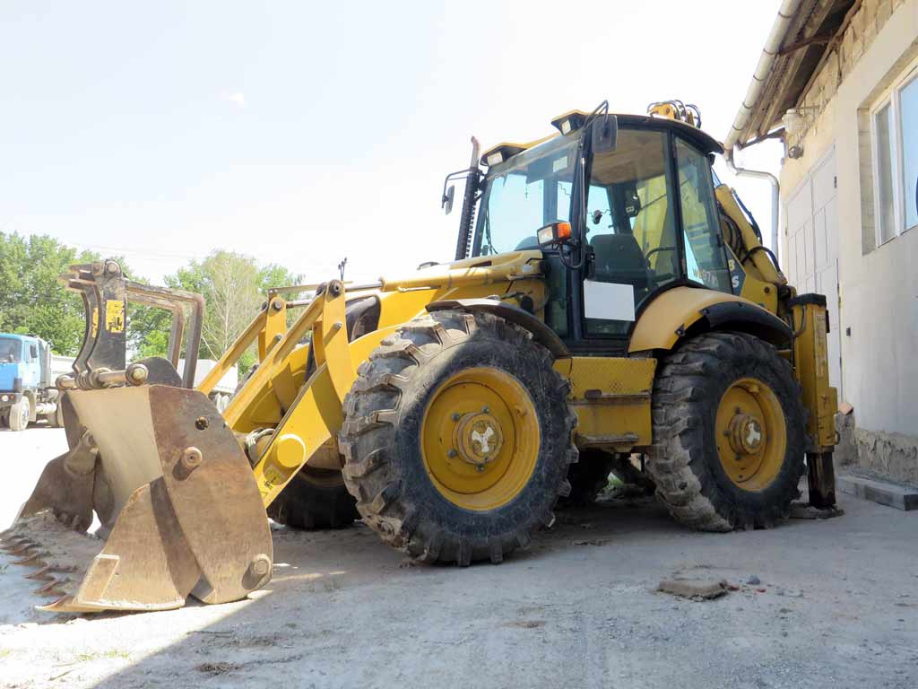 Rypadlo-nakladač Komatsu WB97S - výkonný stavebný stroj